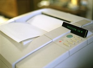 Laser Printer printing out a sheet of paper